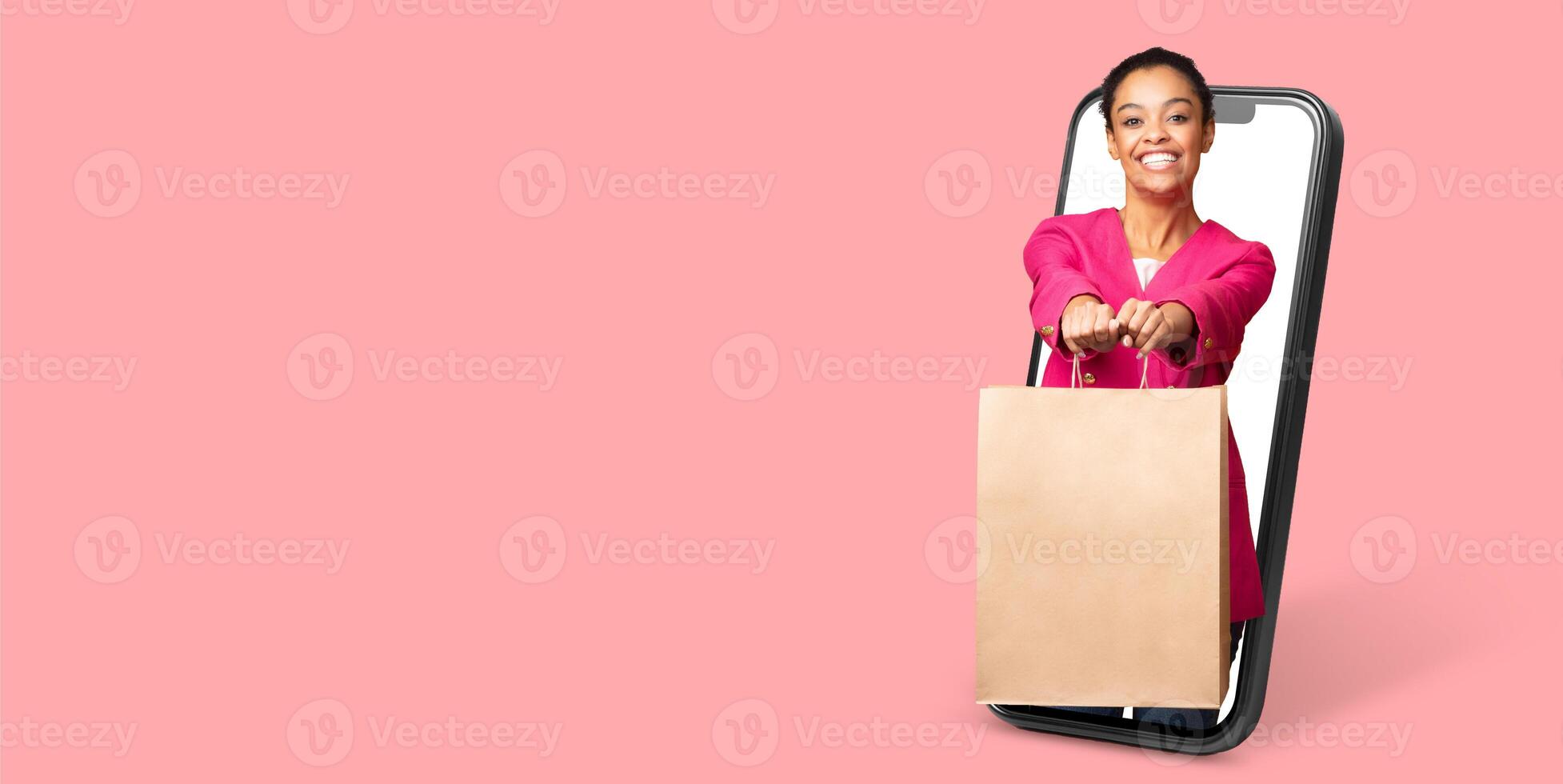 A buyer happily interacts with a smartphone application, showcasing a shopping bag while enjoying the experience of online commerce. The background is isolated, emphasizing the activity. photo