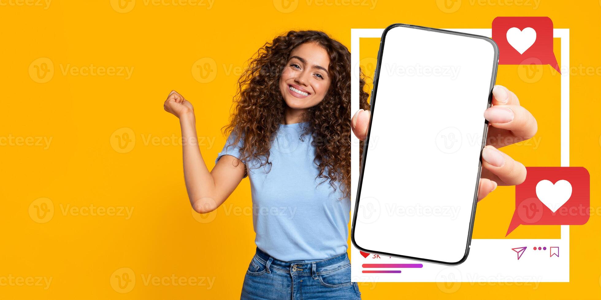An influencer smiles while holding a blank smartphone against a vibrant yellow background. The scene emphasizes social media engagement with chat bubbles, symbolizing online communication. photo