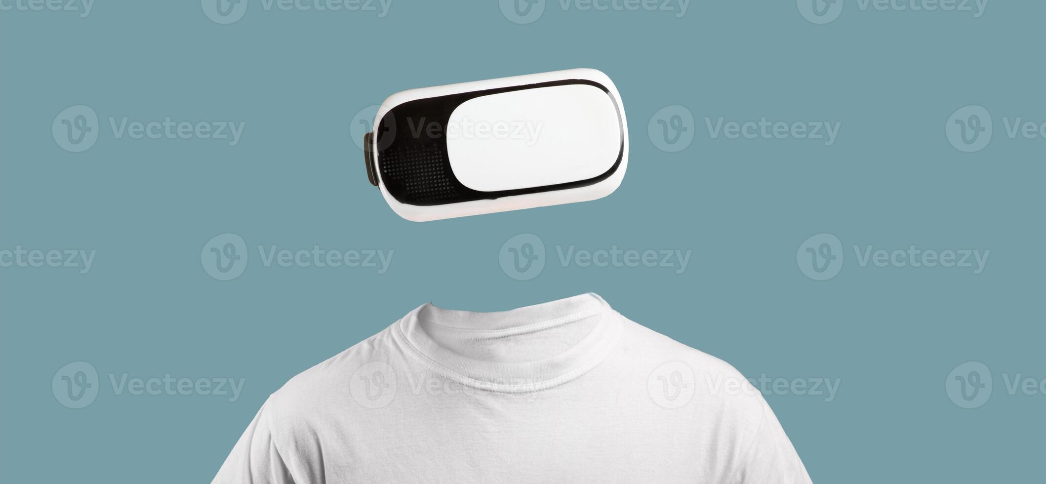 A person engages with virtual reality using modern goggles that cover their eyes, creating an isolated and immersive experience. The background is a solid color, emphasizing the gadget. photo