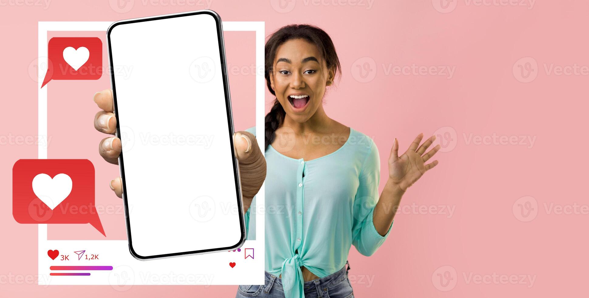 An energetic influencer is holding a smartphone, displaying a blank screen for a new app. She expresses excitement, showcasing the interaction with online messaging and social media. photo