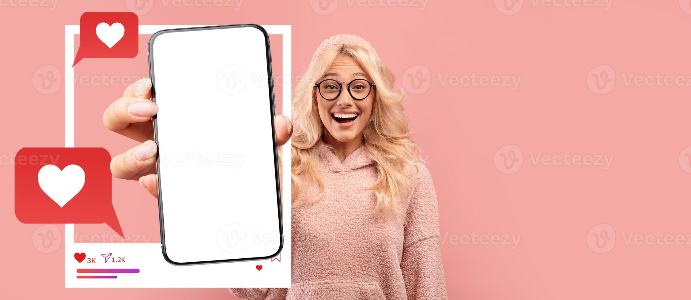 An enthusiastic influencer showcases a smartphone with a blank screen, ready for social media interactions. Bright colors and chat symbols highlight the lively atmosphere of digital communication. photo