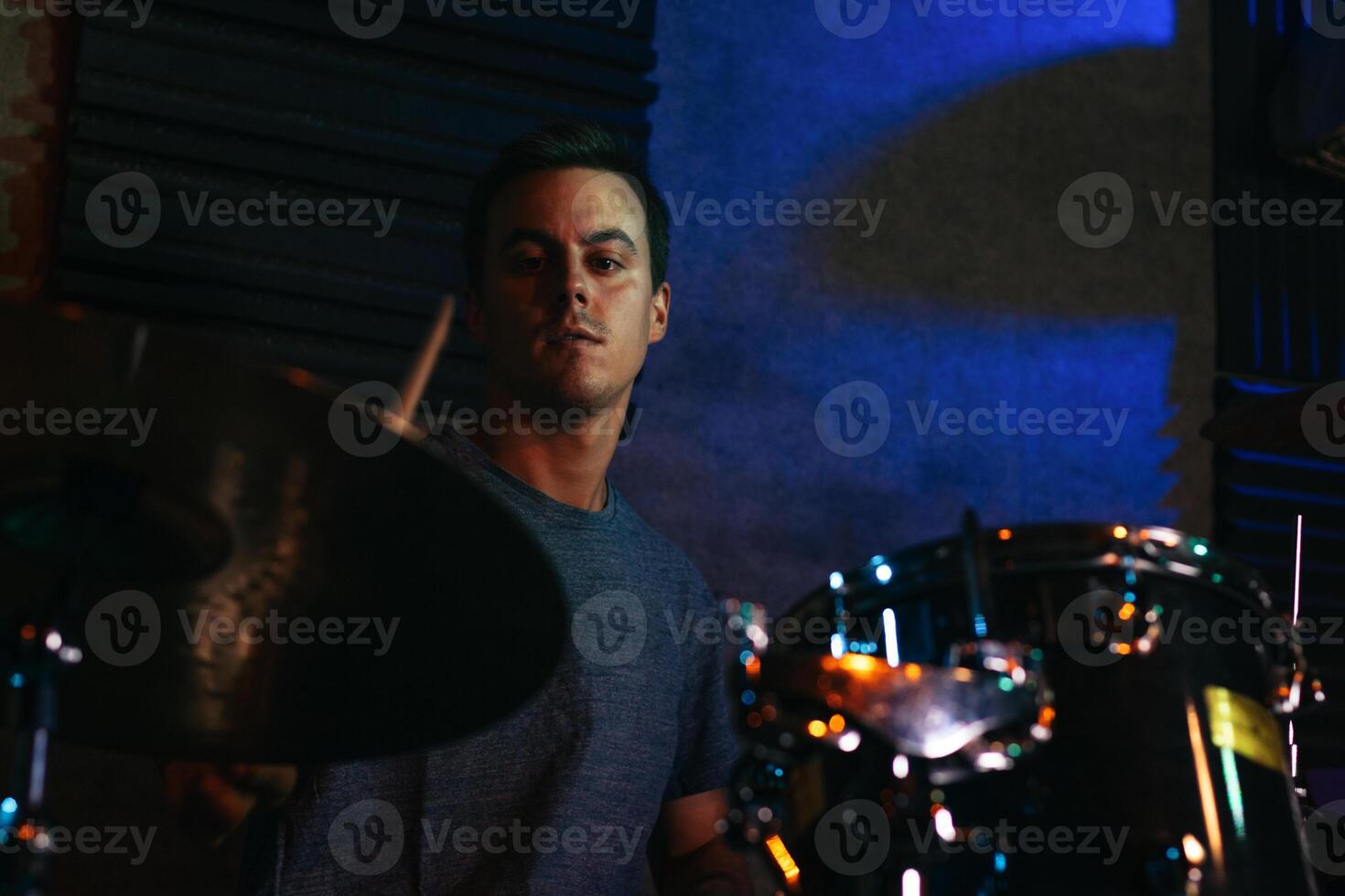 Drummer Performing In A Live Concert photo