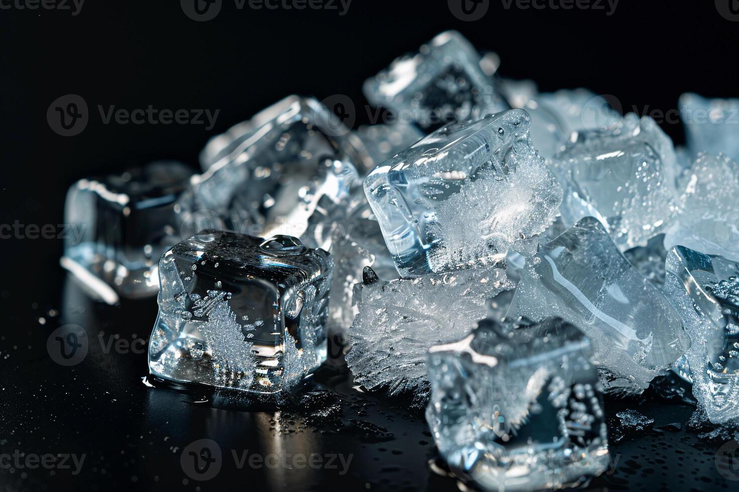 Clear ice cubes cluster on dark surface photo