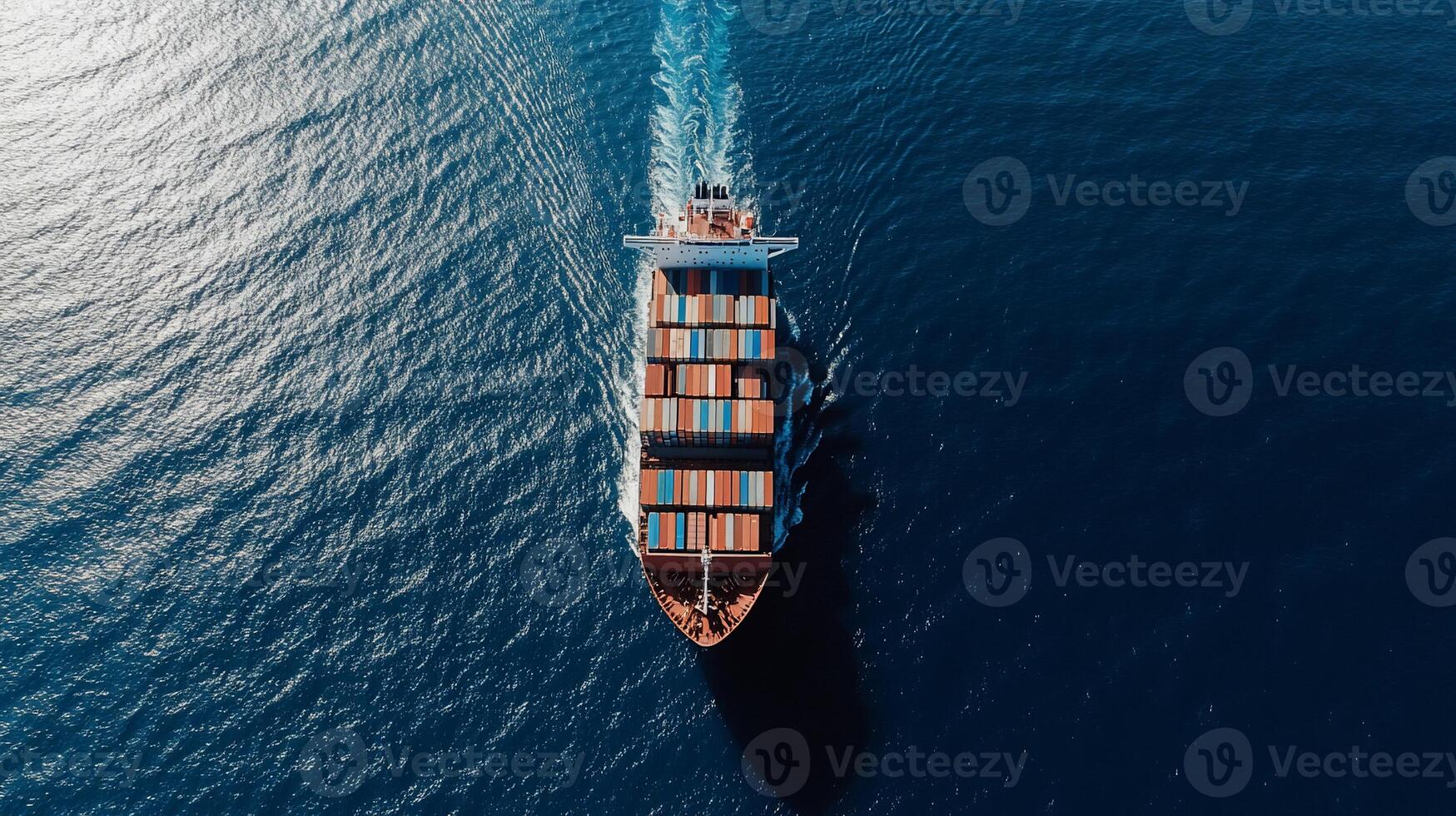 Container ship sailing on the open ocean photo