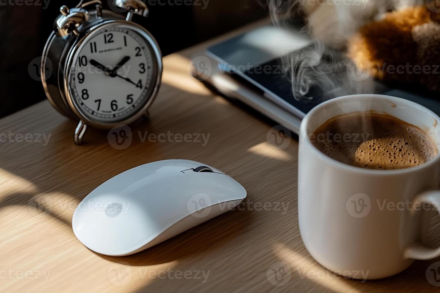 Cozy workspace with coffee and clock photo
