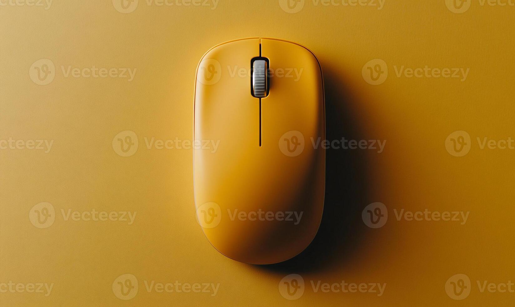 Vibrant yellow computer mouse on a yellow background photo