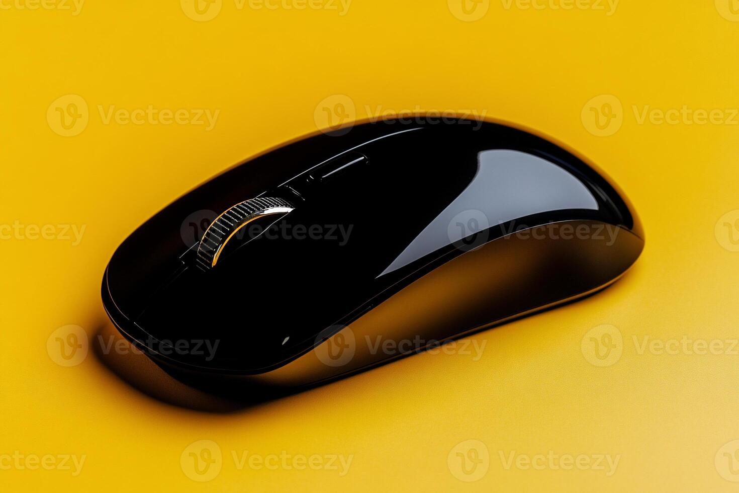 Sleek black wireless computer mouse on yellow background photo