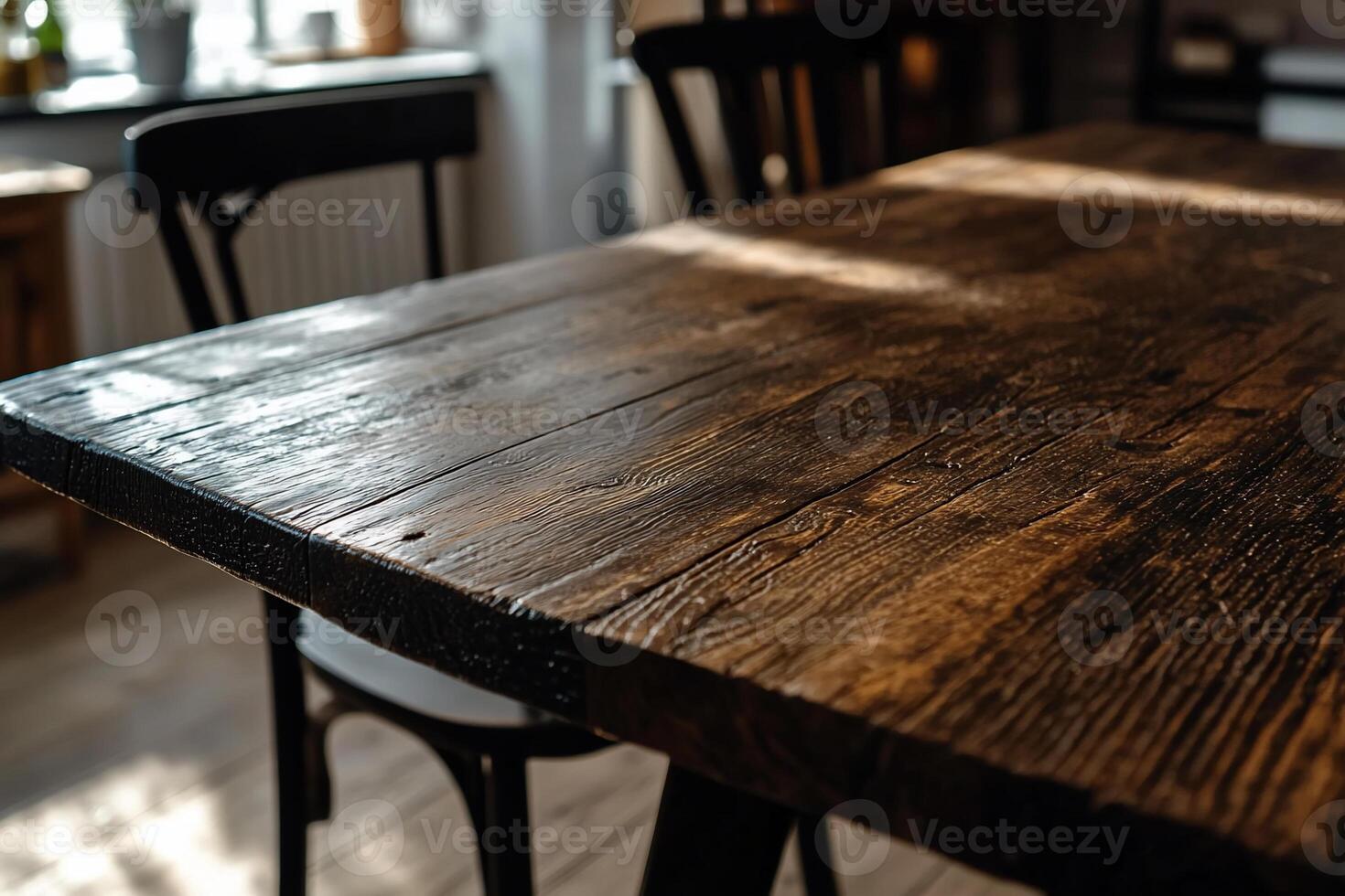 Rustic wooden dining table, sunlight on top photo