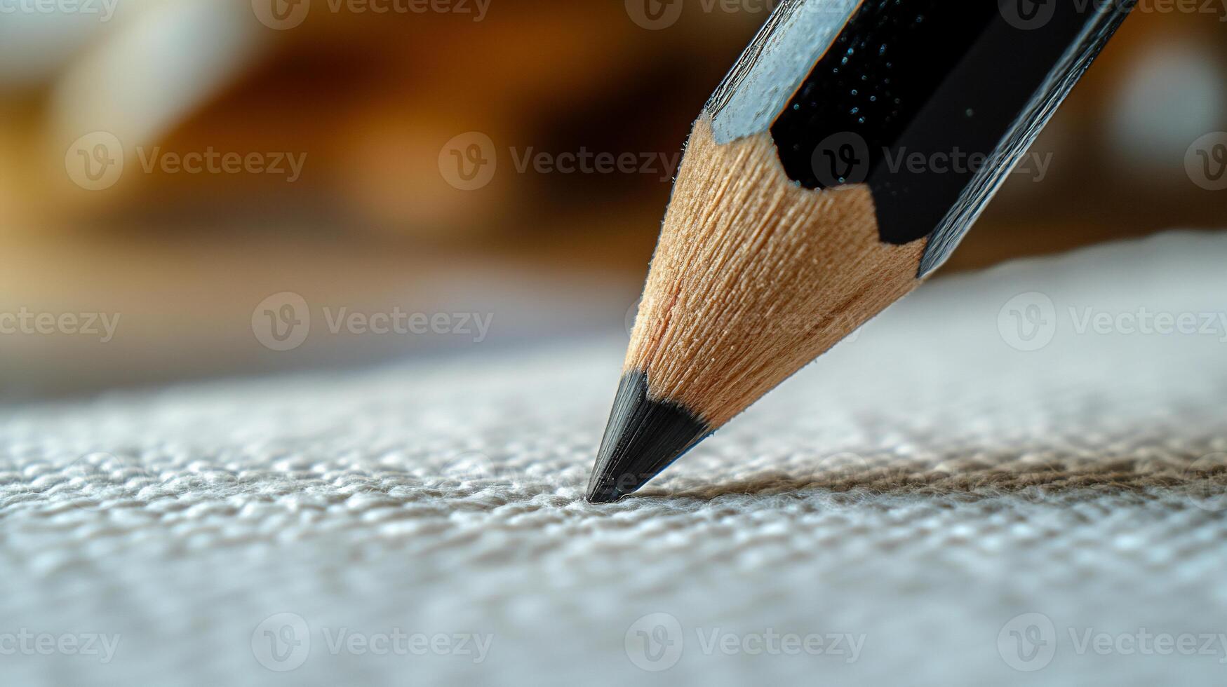 Close-up of a pencil point on paper photo