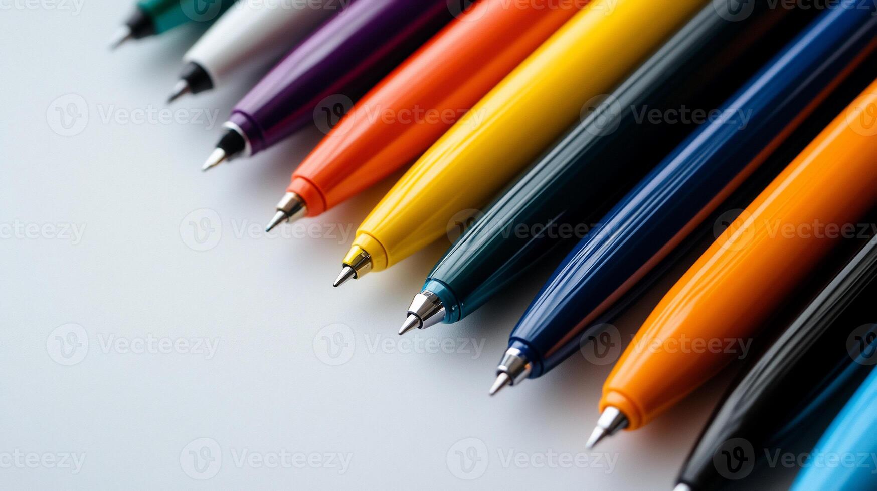 Colorful pens close-up. Variety of vibrant colors. Sharp points. Writing instruments photo