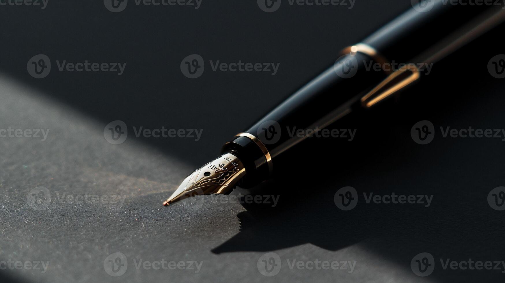 Close-up of a black fountain pen. Detailed view of the nib photo