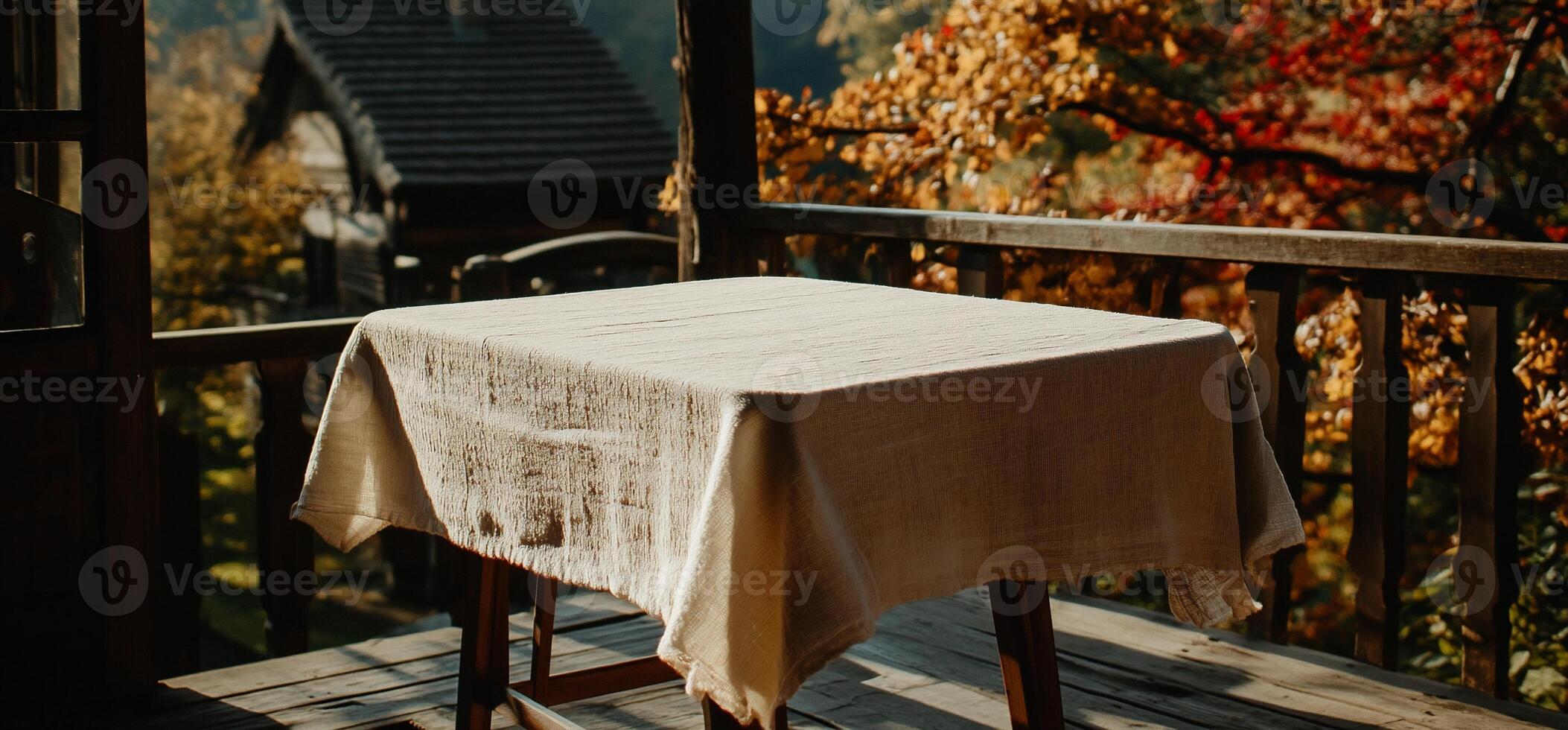 Empty table on a rustic wooden deck photo
