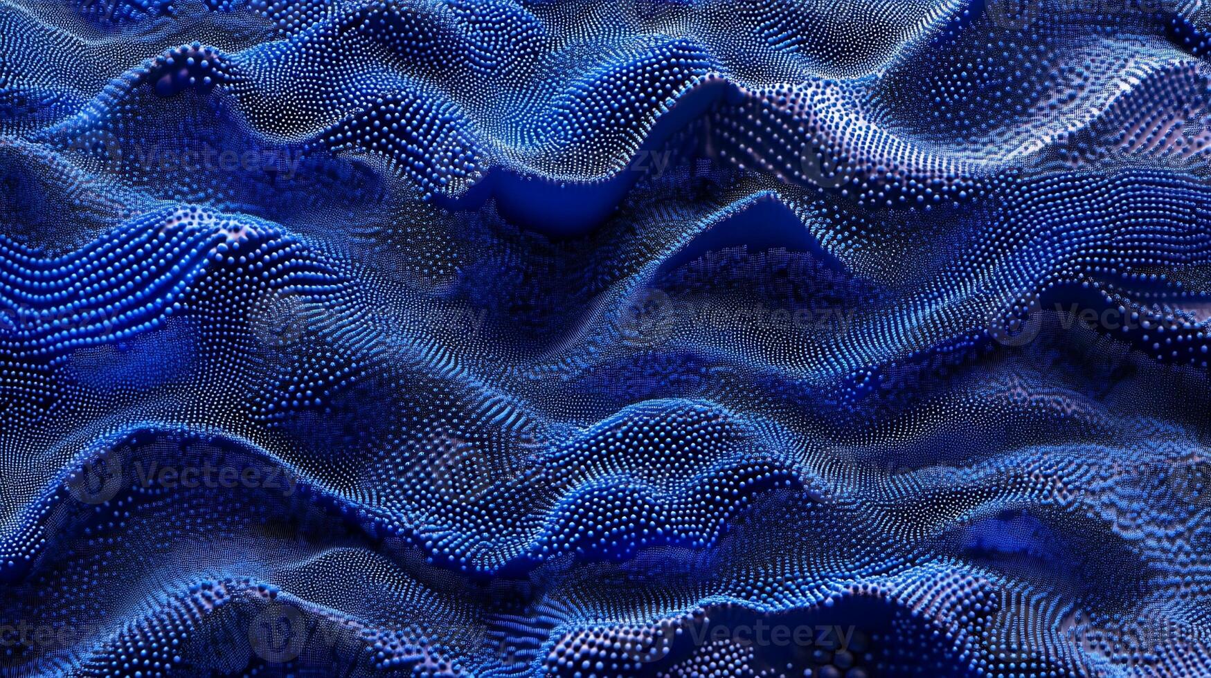 Abstract digital landscape of rippling, deep blue, textured dots photo