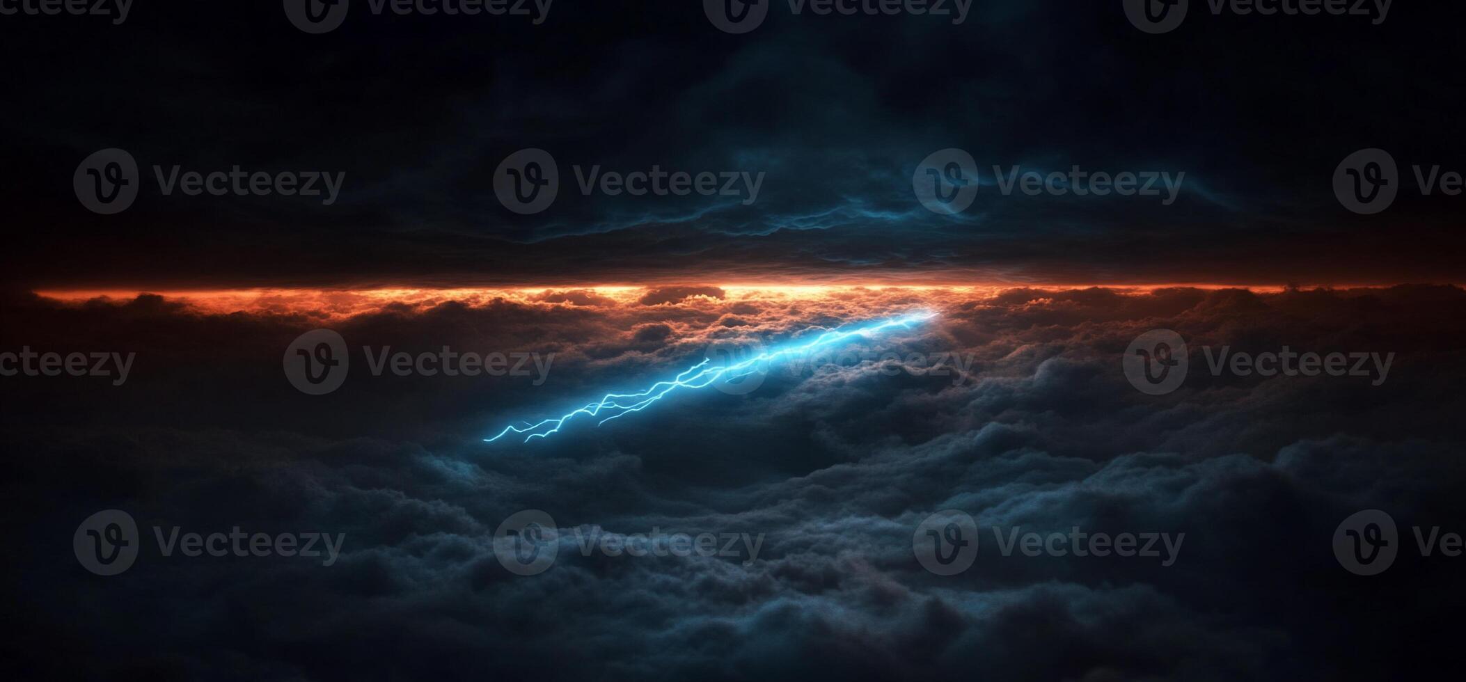 A lightning bolt is seen above clouds photo
