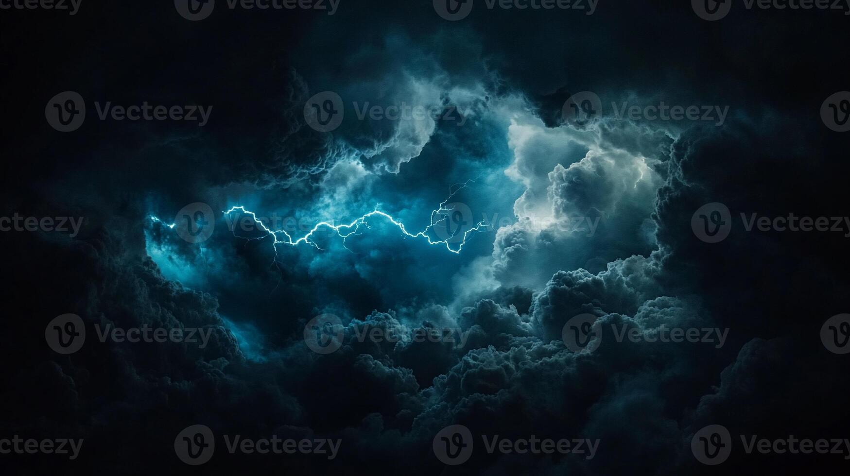 A dark blue sky with clouds and lightning photo