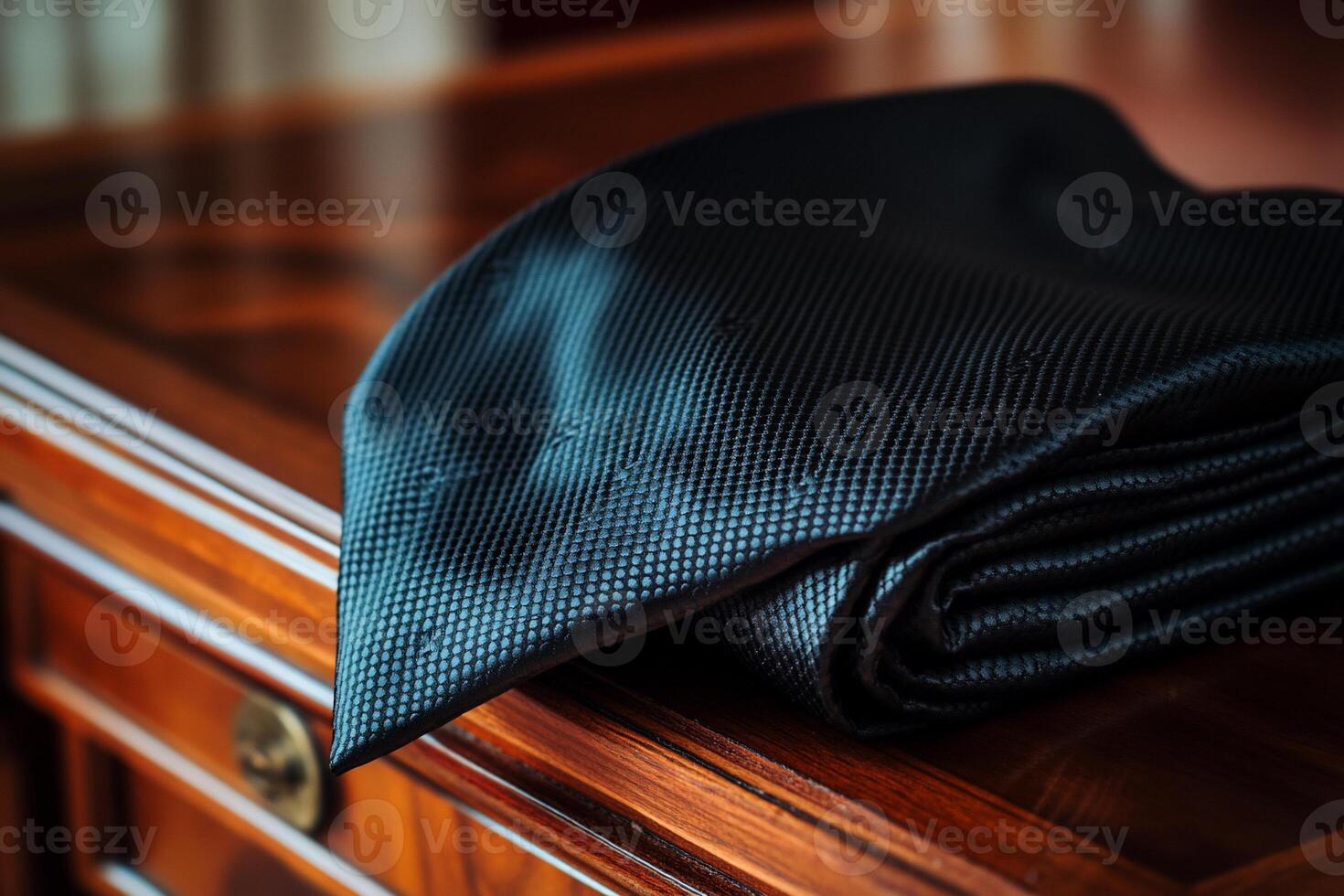 A black tie on a table photo