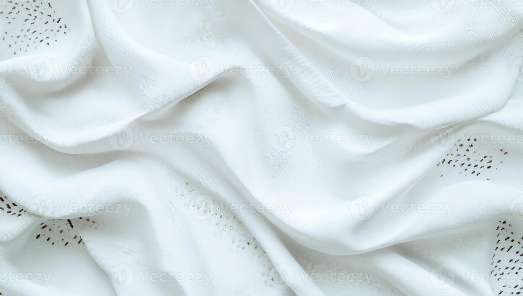 Soft, flowing white fabric with subtle pattern photo