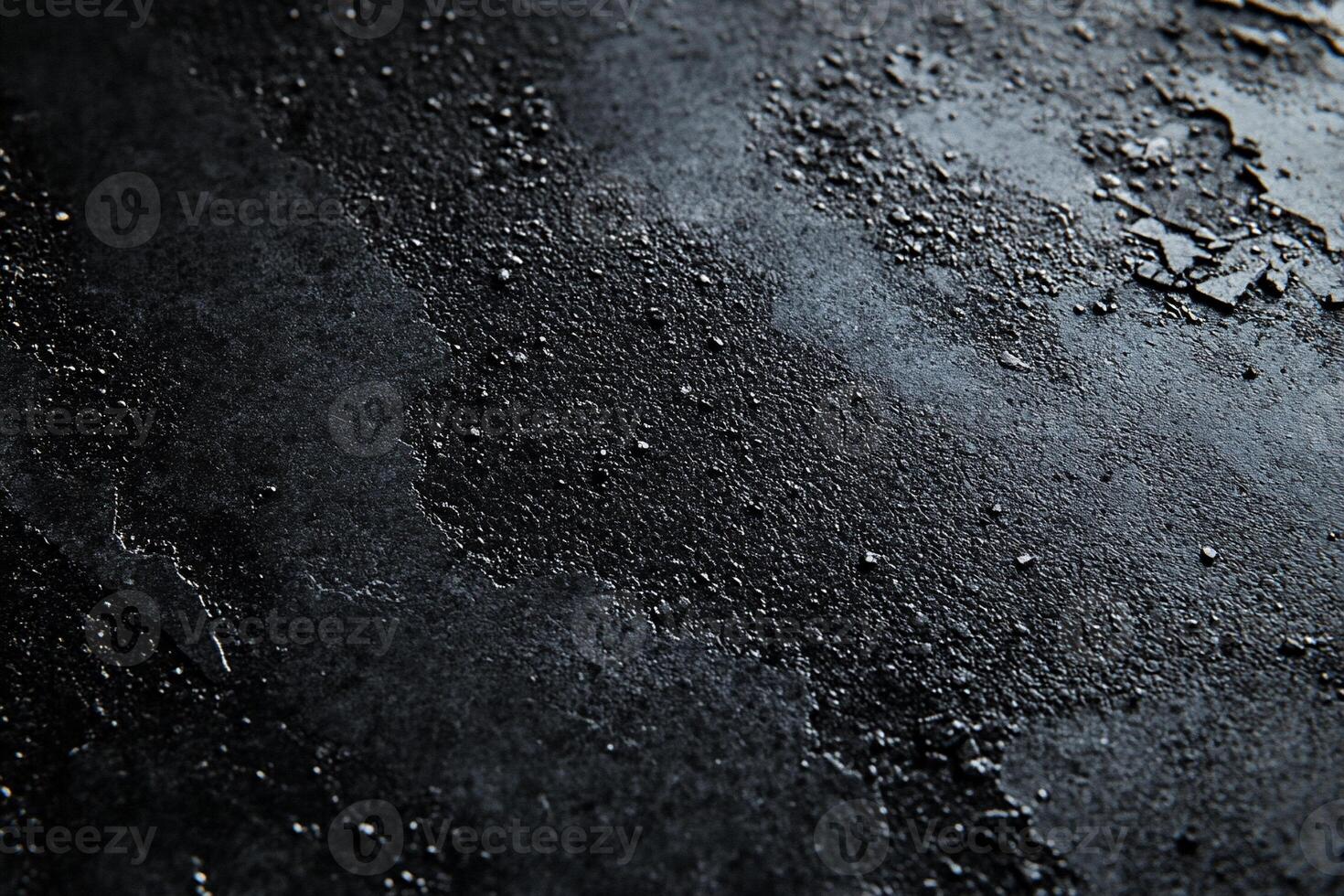 Dark, textured surface with mottled, distressed finish photo