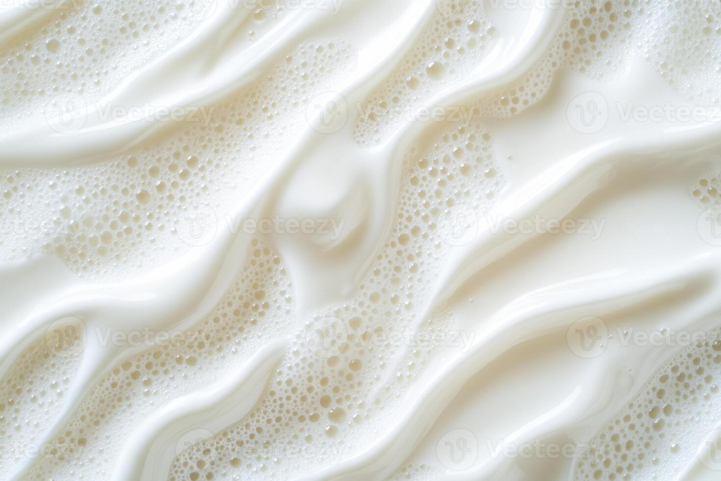 Top-down slow motion capture shows a splash of fresh milk with suspended droplets, highlighting its fluid dynamics and purity photo