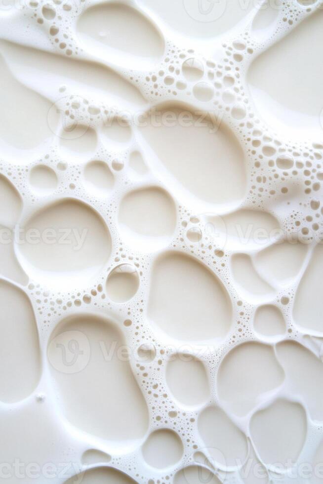 Top-down studio capture of a milk splash in slow motion, emphasizing the dynamic shapes and suspended droplets, conveying a sense of purity and freshness photo