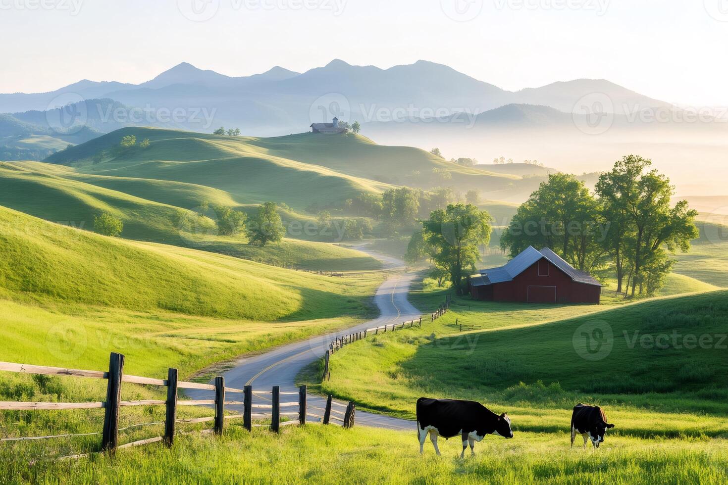 Cows grazing near a scenic road and barns in a beautiful green valley photo