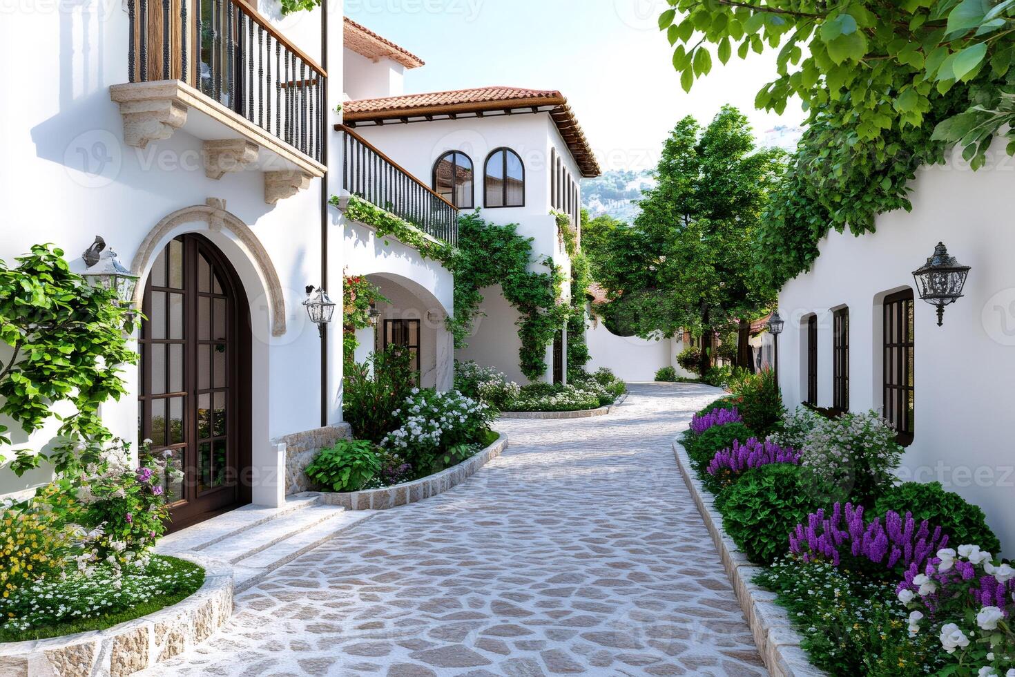 Mediterranean architecture illuminating a picturesque cobblestone street with lush vegetation photo