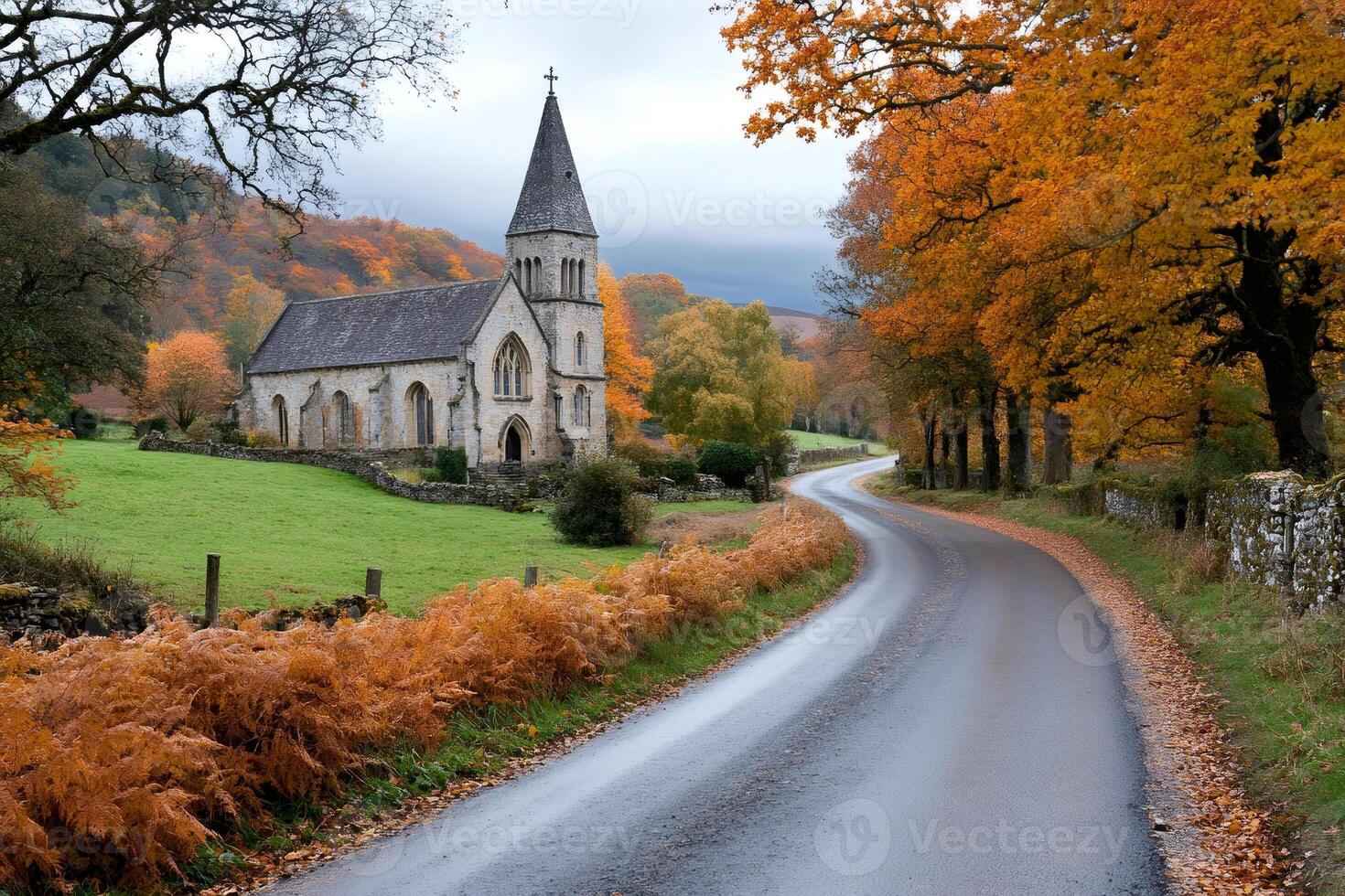 Winding road leading to a church in the Peak District National Park during autumn photo