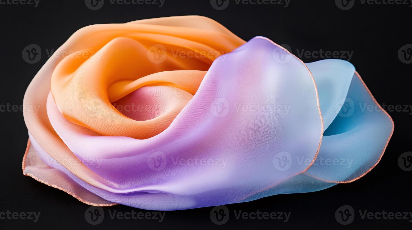 Silk scarf with orange, purple and blue gradient on black background photo