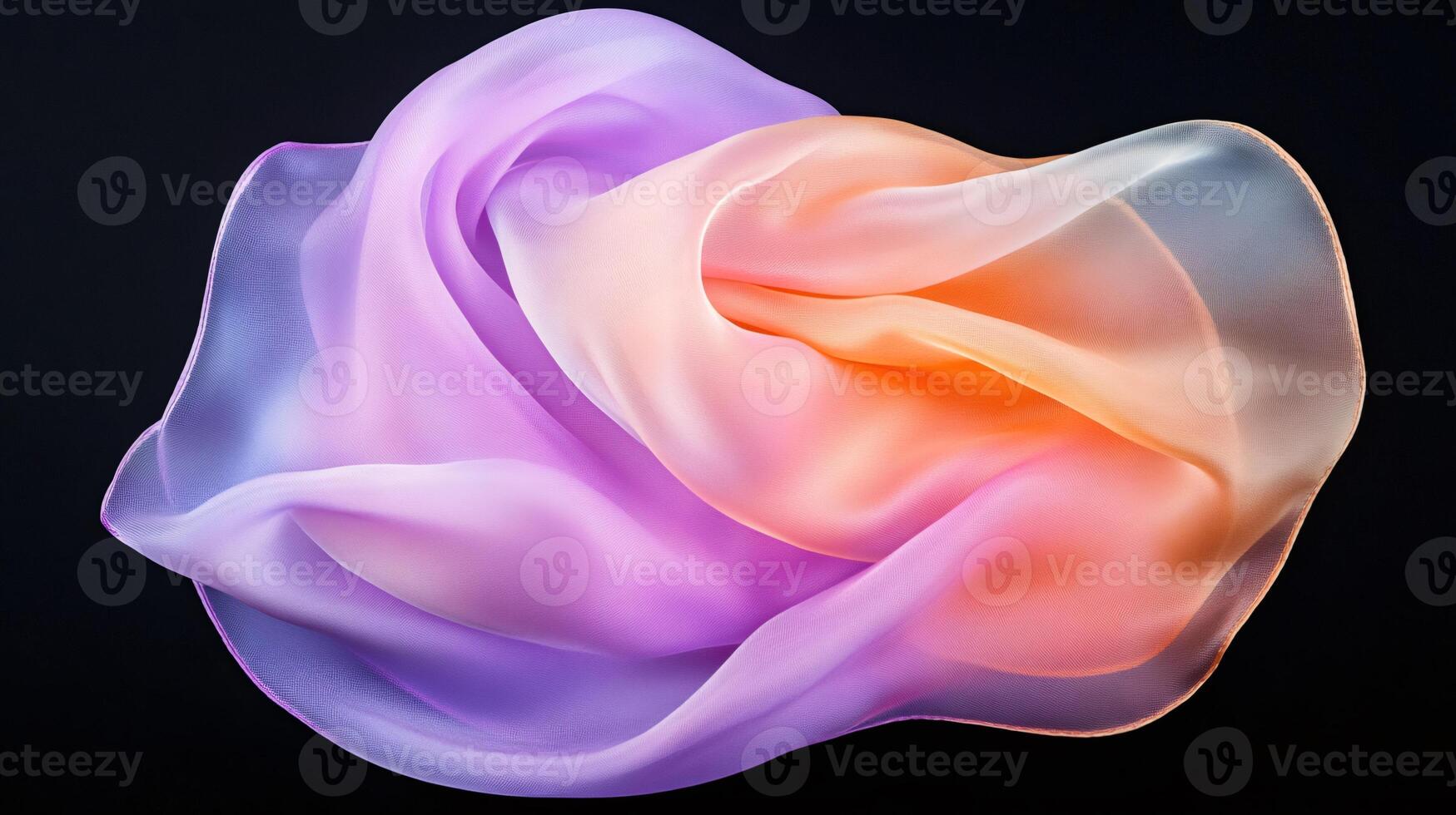 Purple orange gradient silk fabric flowing on black background photo