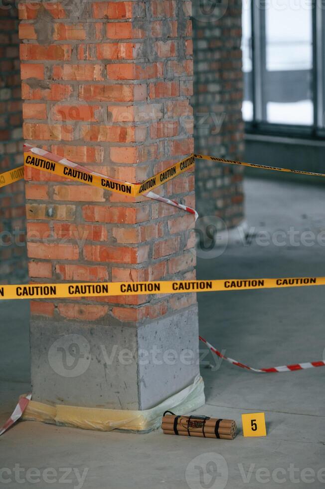 Clue number five. Explosive bomb is indoors. Police ,investigation. Conception of terror photo