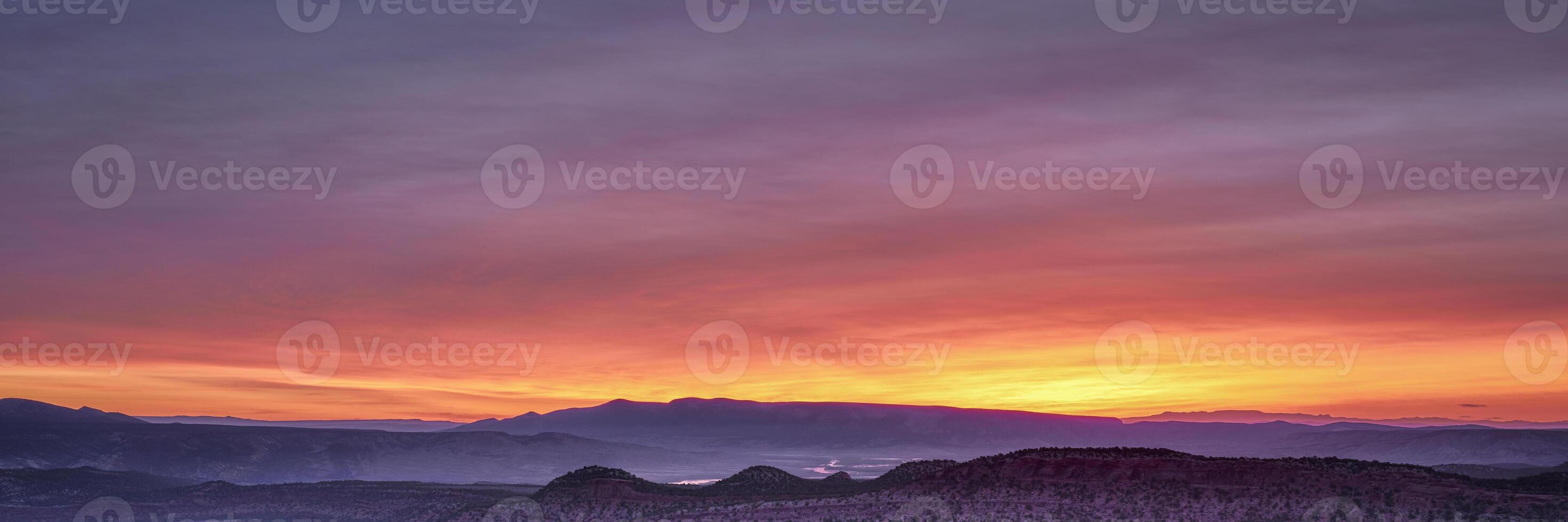 colorful sky over Yampa River at dawn - panoramic banner photo