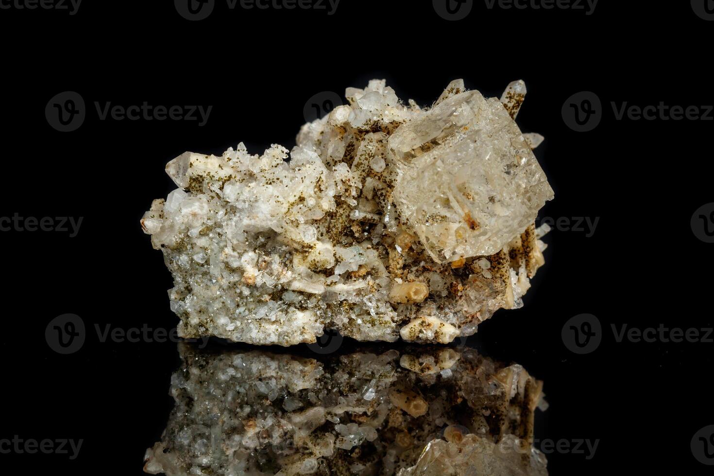 close-up Macro mineral stone fluorite with quartz against black background photo