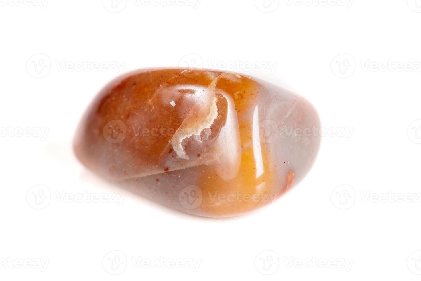 Macro mineral stone Carnelian close-up on white background photo