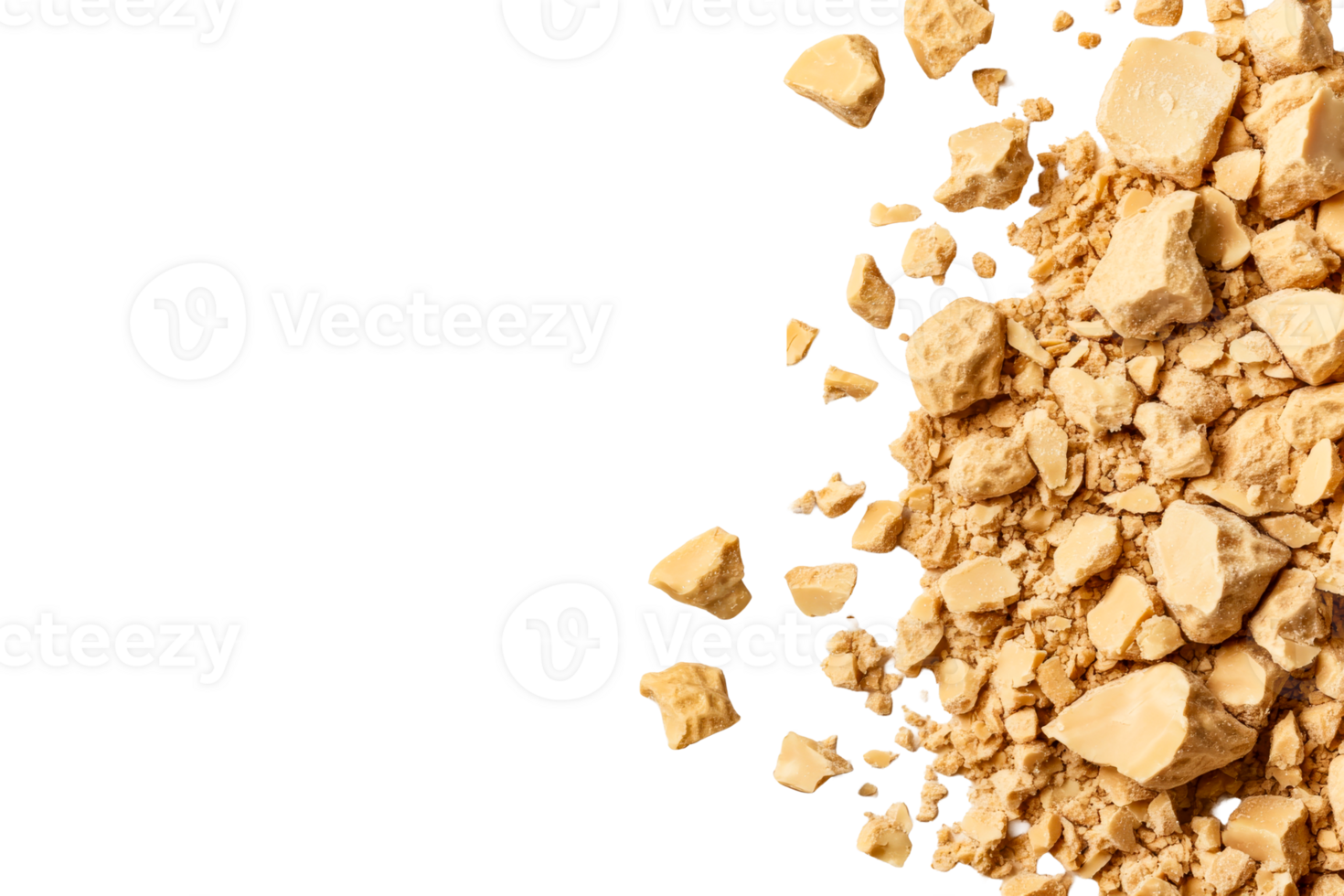 Heap of irregular caramel chunks, crumbs on black backdrop, cut out transparent png