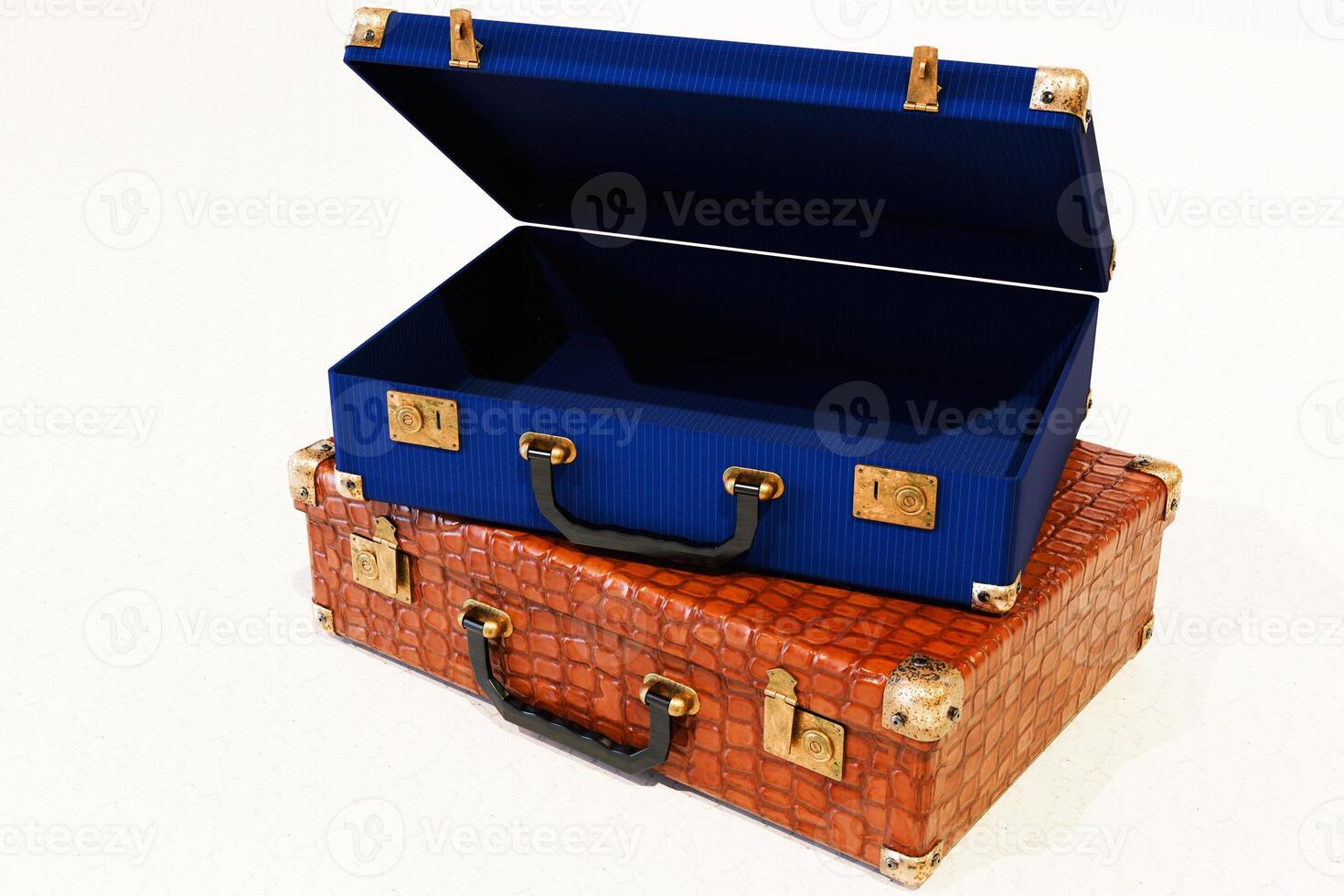 Two elegant suitcases stacked, one blue with an open lid and one textured brown, showcasing vintage style and decorative detailing. photo