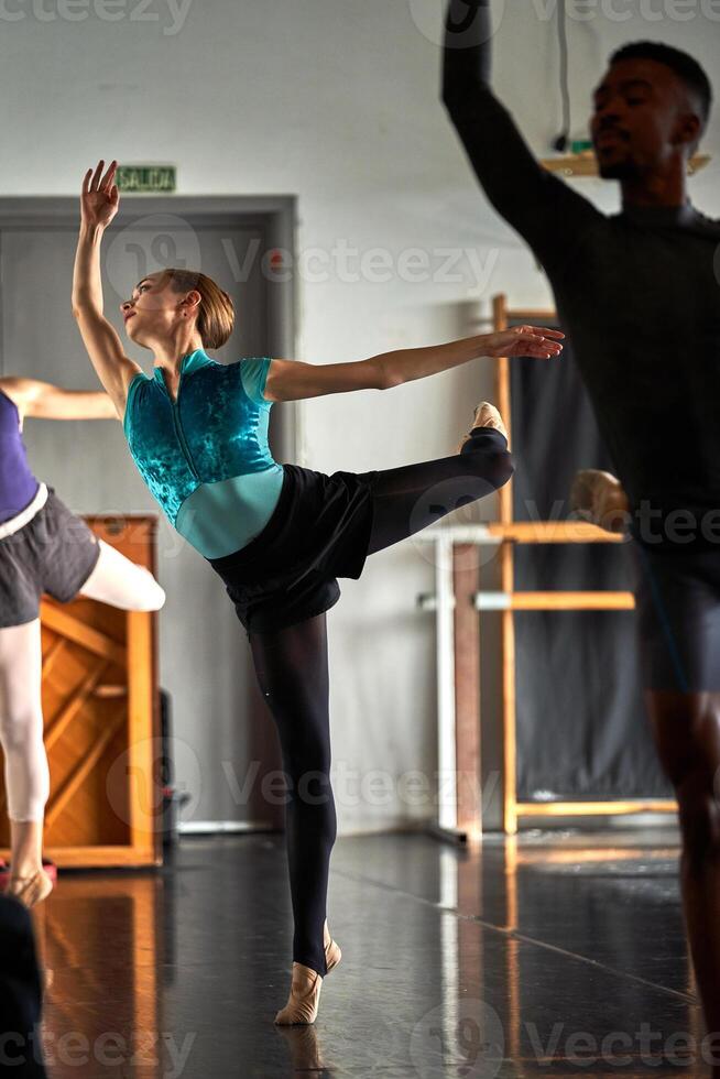 A group of dancers in a dance studio photo