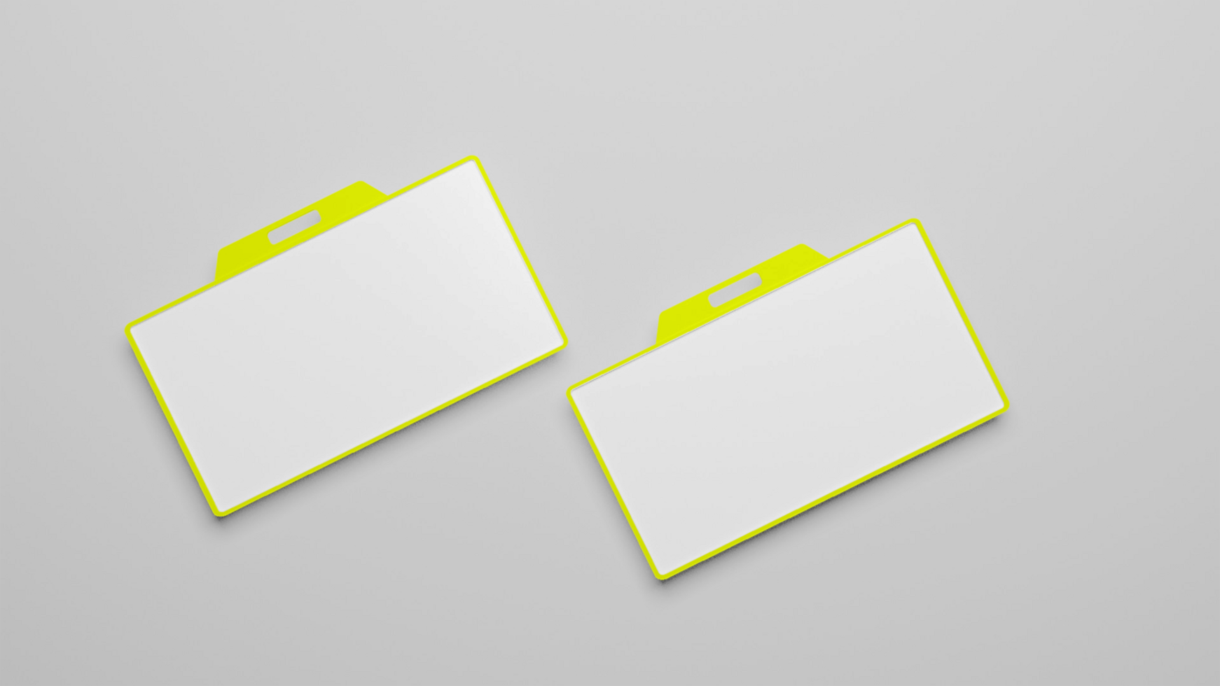 Two blank white plastic file folders on a gray background psd