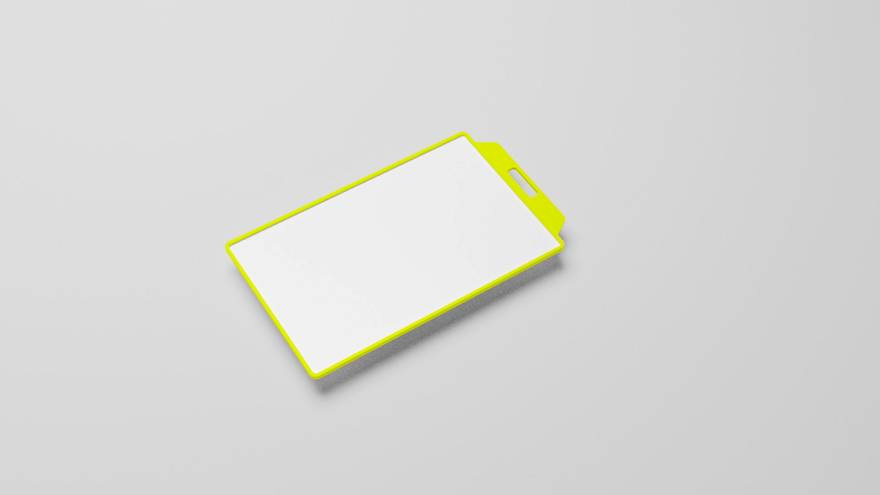 A yellow and white blank piece of paper on a gray surface psd