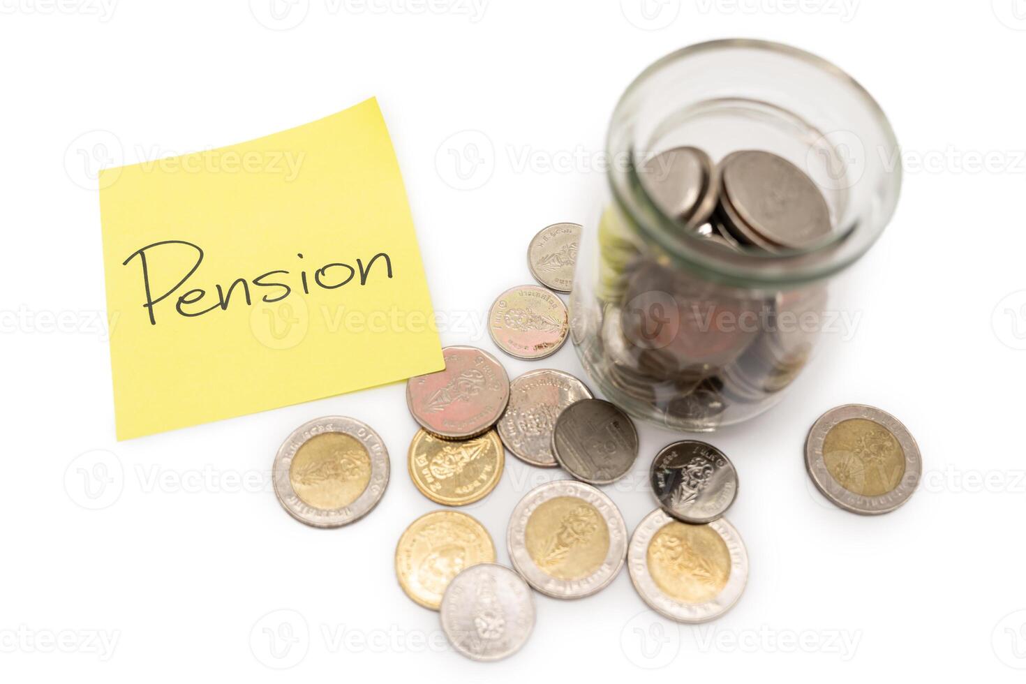 PENSION text on sticky note. Thai Baht Coins spilled out of jar glass isolated on white background, saving for future. photo