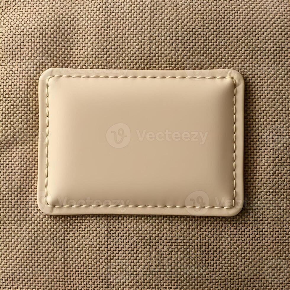 Detailed view of a small leather patch on the back of a beige fabric for mockup 2 photo