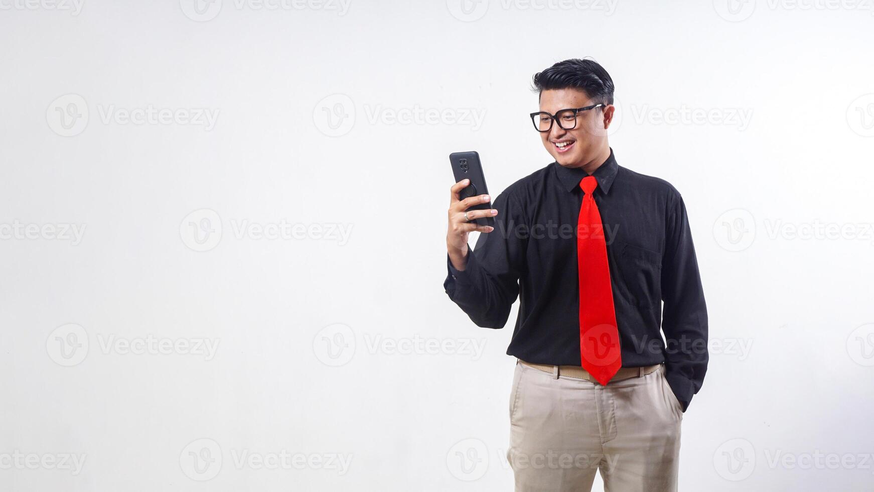 Side view of happy Asian employee business man corporate wearing formal clothes hold in hand use mobile cell phone isolated on white background photo