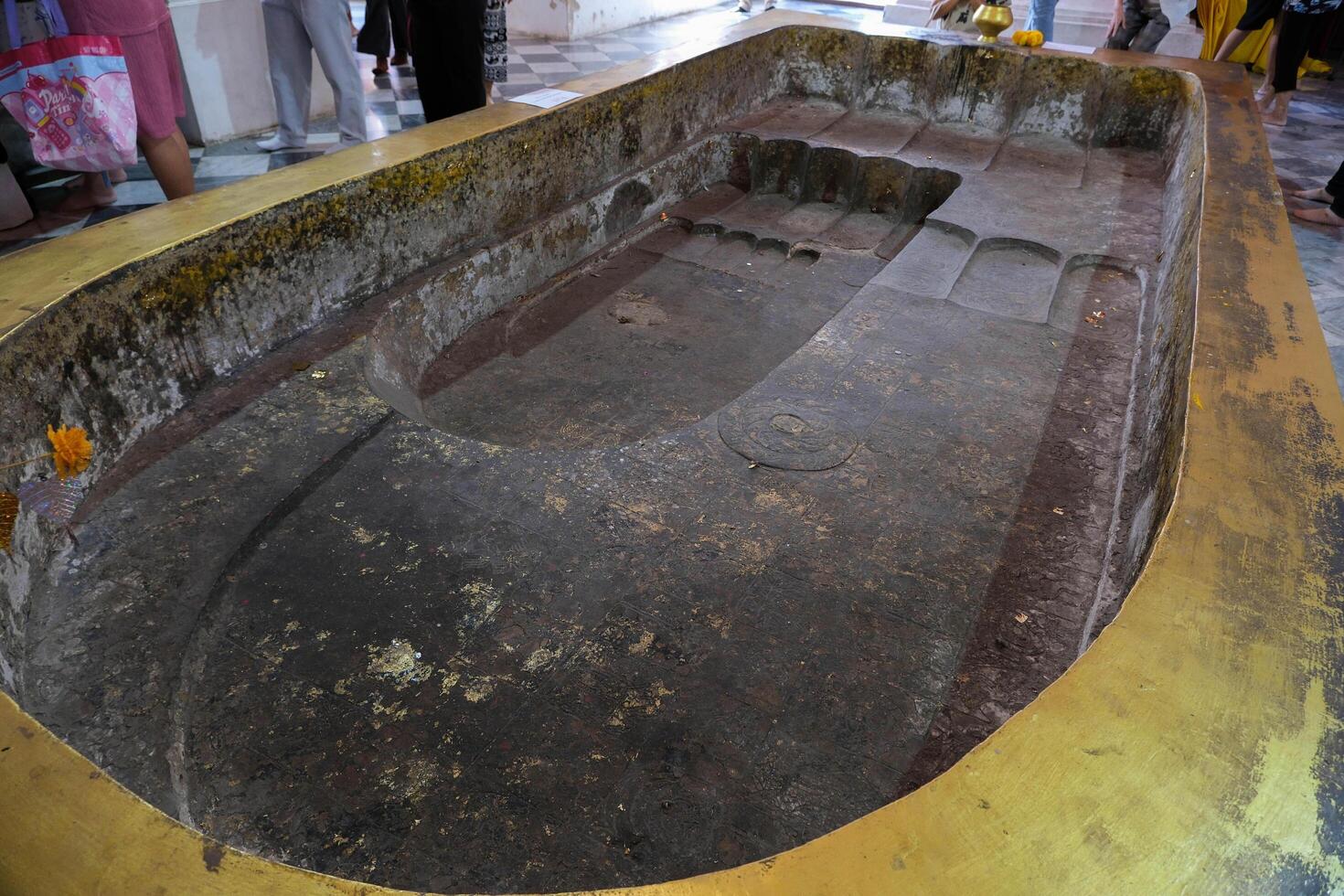 Close-up of the replica of Buddha's footprint at Nakhon Luang Palace, Ayutthaya, Thaiand photo