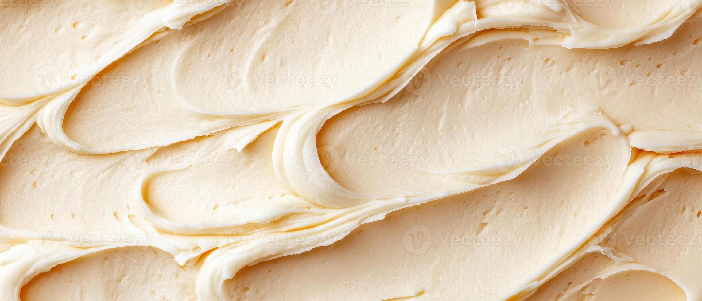 Creamy buttercream frosting with smooth swirls and texture, perfect for decorating cakes and desserts. This rich icing adds delightful touch to any sweet treat photo