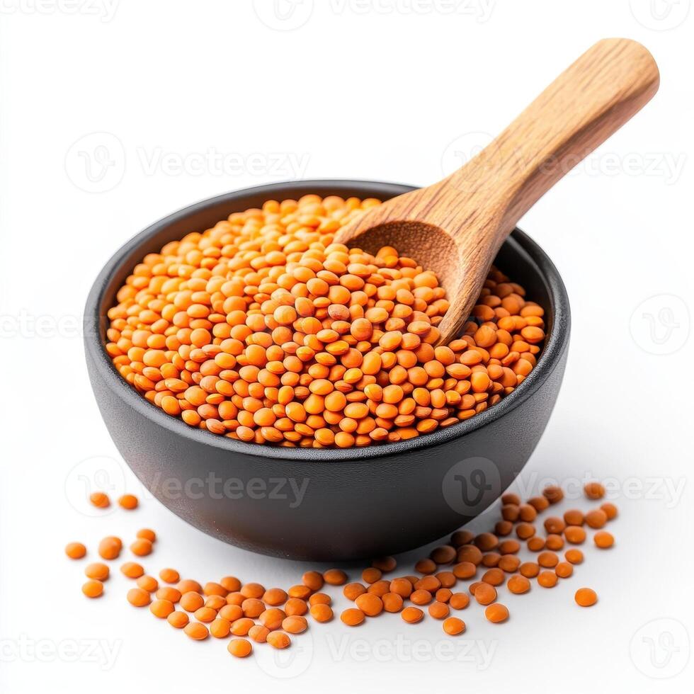 bowl of dried red lentils with wooden spoon, perfect for vegetarian dishes and healthy cooking. These lentils are nutritious ingredient for various recipes photo