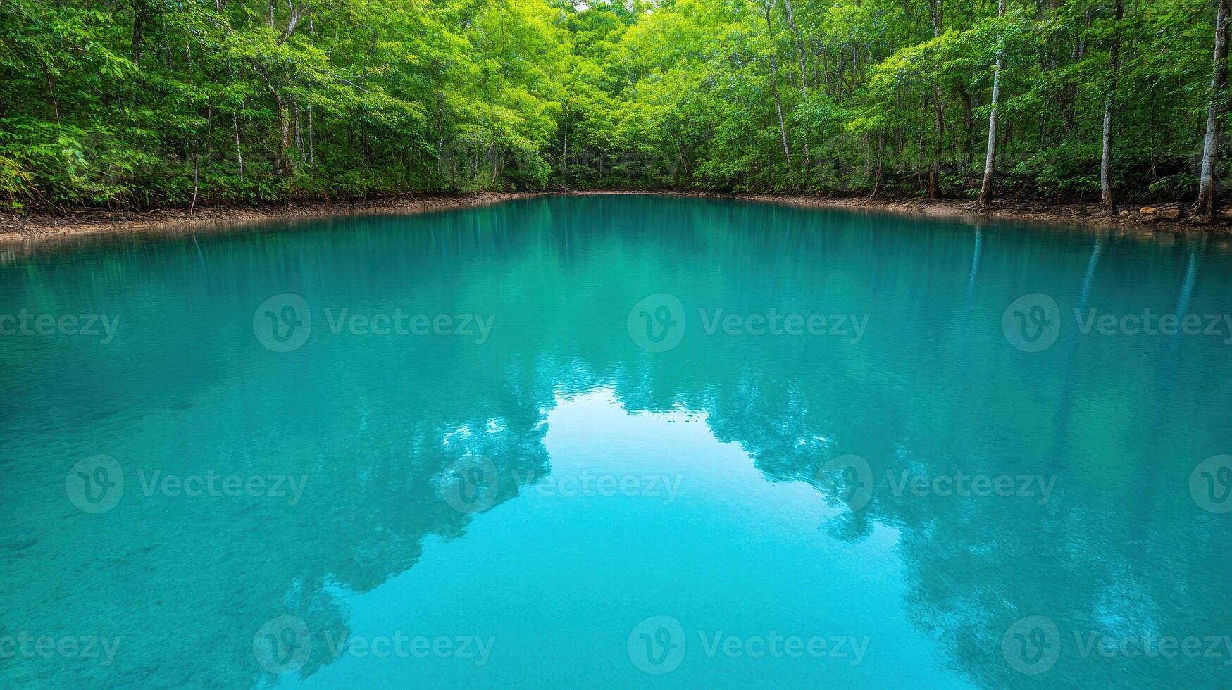 serene landscape featuring tranquil body of water surrounded by lush green trees, reflecting vibrant colors of nature. crystal clear water invites sense of peace and calm photo