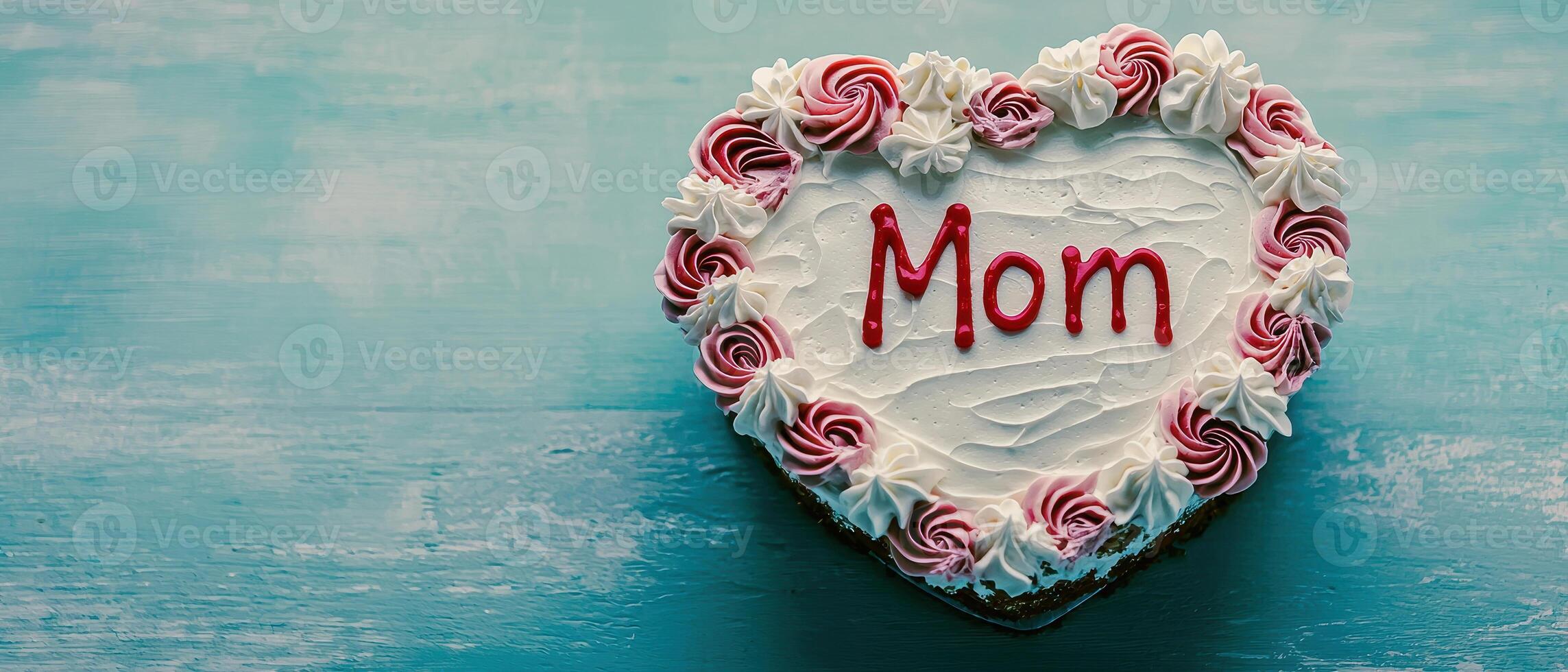 beautiful heart shaped cake adorned with pink and white frosting celebrates love for mothers on this special day photo