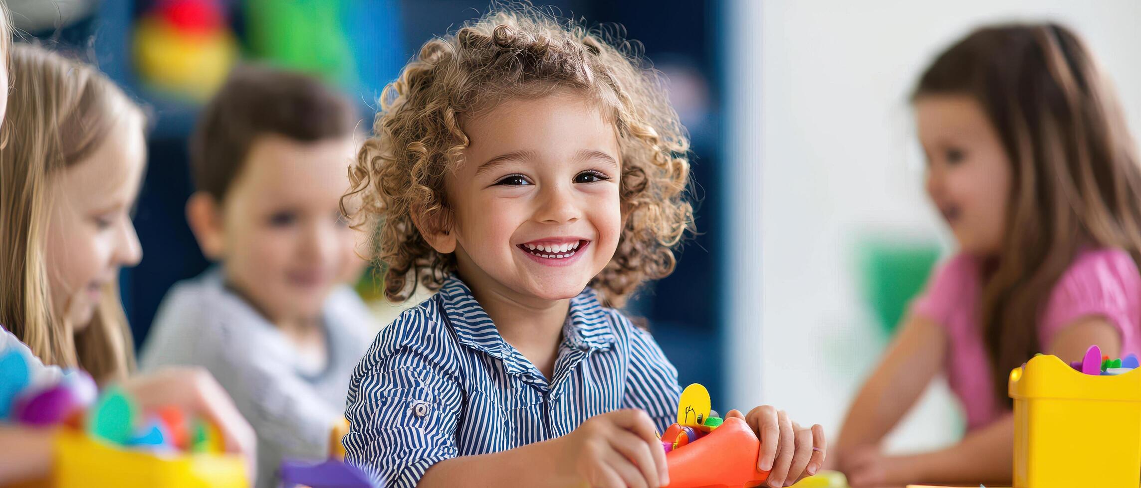 happy child playing with colorful toys in classroom setting photo