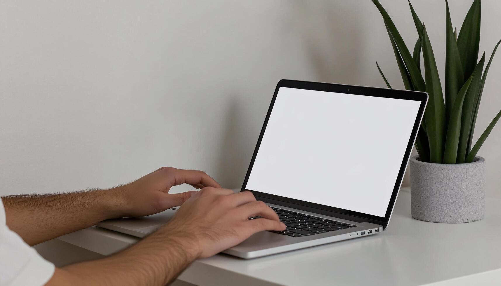 Device Mockup with Person Using Laptop in Modern Setting photo