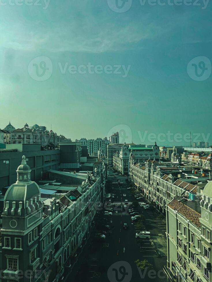 A view of a city street with a clock tower in the background photo