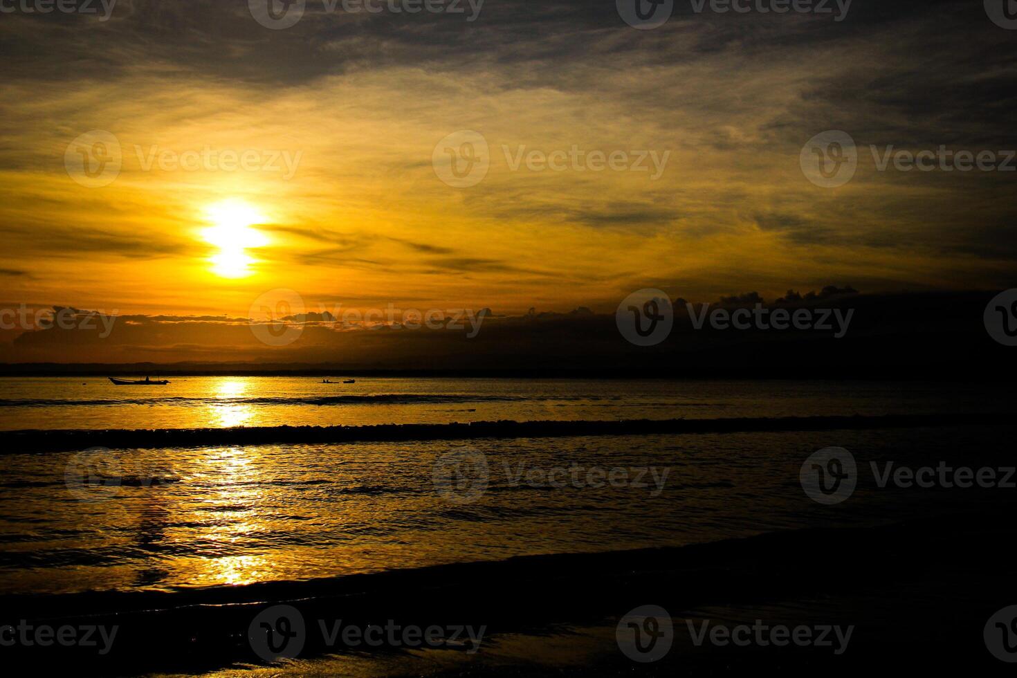 A person flying a kite on a beach photo
